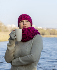 Lady in traditional northern scarf and sweeter