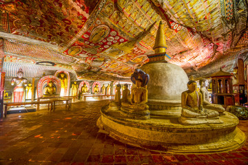 Fototapeta premium Buddha statues in Dambulla Cave Temple, Srilanka