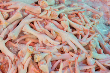 Fresh chicken foot in the market