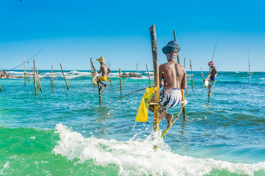Sri Lankan unique tilt fishing style. Fishermen on the pole