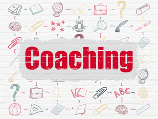 Education concept: Coaching on wall background
