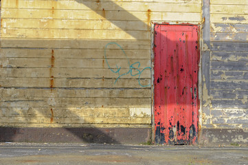 Washed out red door.