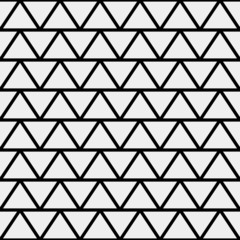  Repeating geometric tiles of rhombuses or triangles