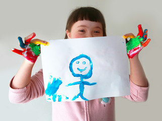 Cute girl with her painting