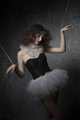 woman with bizarre puppet mask