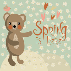 Cute bear on a spring meadow