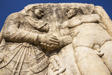 King Mithridates shaking hands with god Herakles