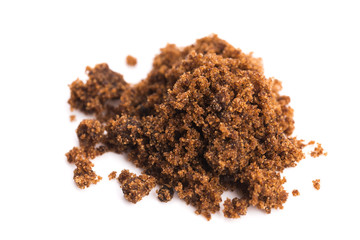 brown muscovado sugar isolated on a white background