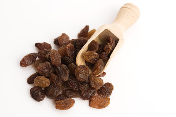 Dried raisins on a white background