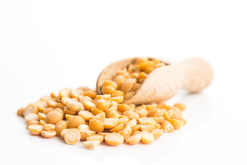 Yellow split peas isolated on white background