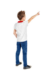 Rear view of a school boy over white background pointing upwards - 82853571