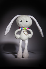 knitted gray rabbit with dimonds heart