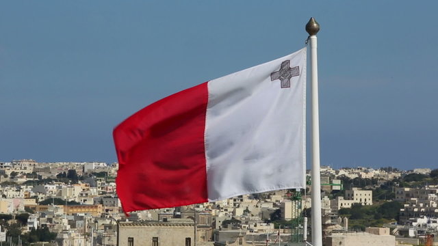 Valletta harbor view with flag of Malta