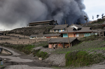 Fototapeta na wymiar Volcanic eruption in the Cemoro Lawang town on Jawa in Indonesia