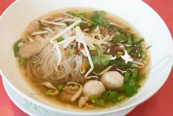 Pork meatballs and steam fish in noodle soup