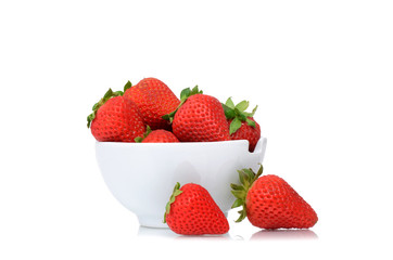 fresh organic strawberries in bowl isolated on white background