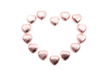 chocolate hearts candies on white