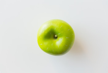 ripe green apple over white