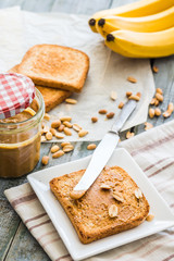 crispy toast with peanut butter, bananas, breakfast