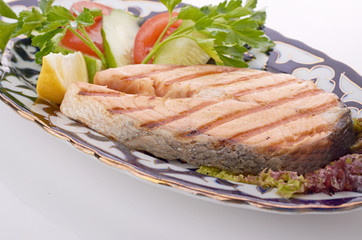 grilled salmon with asparagus, pea, yellow peppers, carrots and