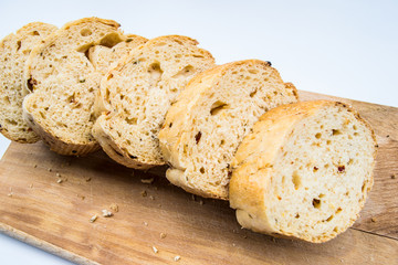 cut bread on wooden board