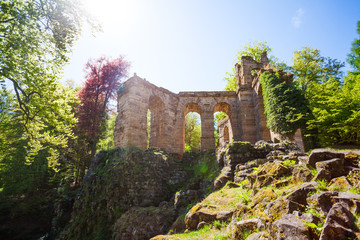 Fototapeta na wymiar Spring view of aqueduct ruins in Bergpark