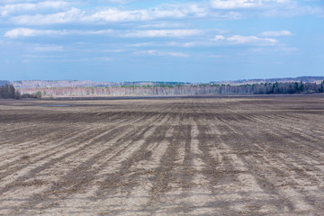 Empty not plowed field after winter