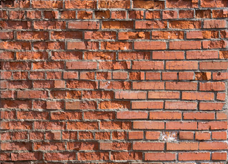 cracked worn red brick wall background