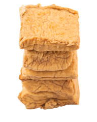Homemade fried tofu over white background
