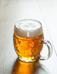 czech beer in the glass on vintage background