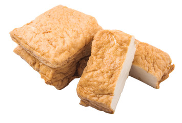 Homemade fried tofu over white background