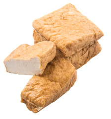 Homemade fried tofu over white background