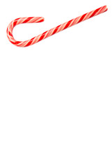 Fototapeta premium Christmas red and white stripe candy cane over white background