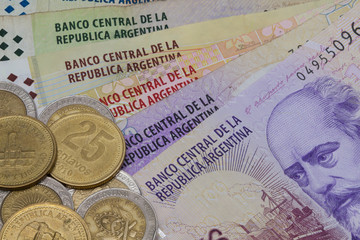 Fototapeta premium Various banknotes and coins from Argentina