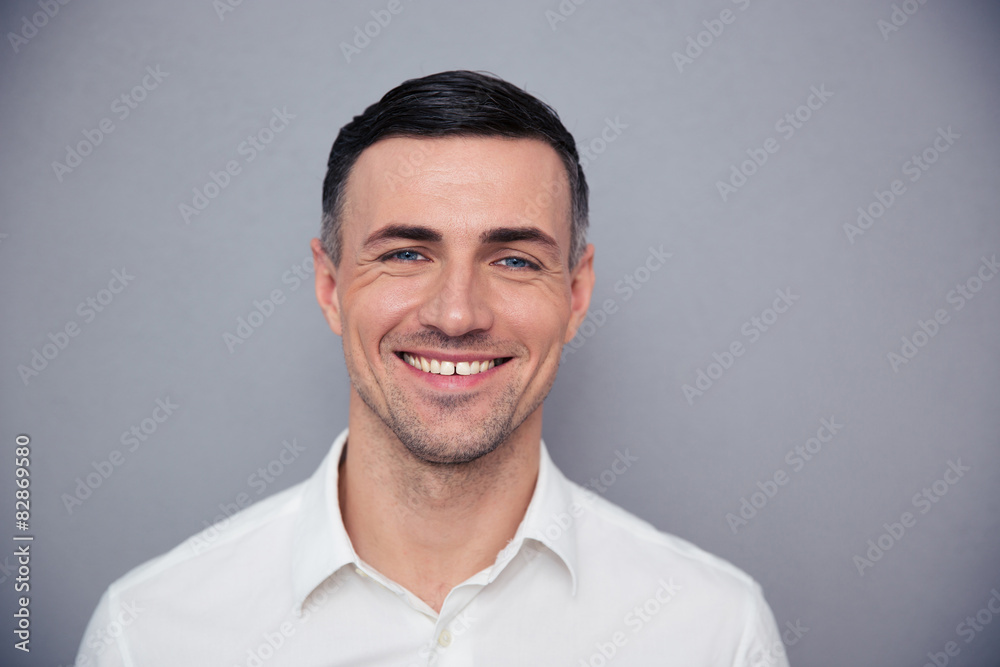 Poster Portrait of a happy young businessman