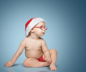 little baby with Santa hat and glasses