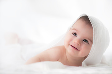 Cute baby boy on white background.