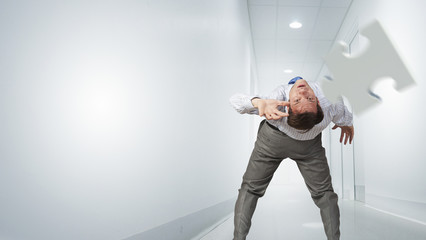 Man evading flying puzzle 