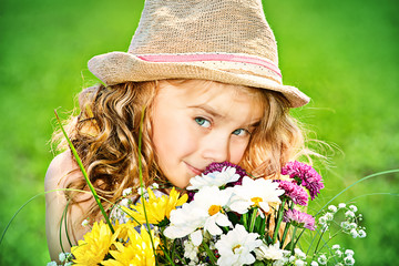 child with flowers
