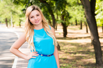 Beautiful young woman  on the summer park