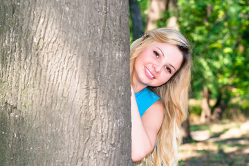 Beautiful young woman  on the summer park