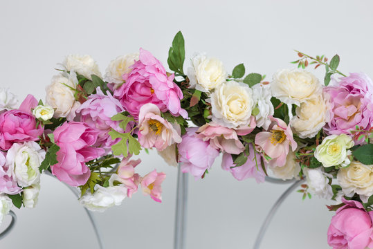 Part of wedding arch with pink and white flowers