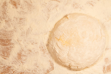 fresh the dough is ready for baking on wooden background
