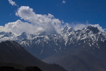 Fototapeta na wymiar cold snow peaks of the Himalayas
