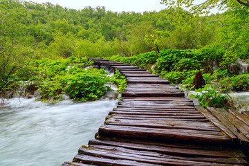 Fototapeta na wymiar Wooden path in National Park in Plitvice