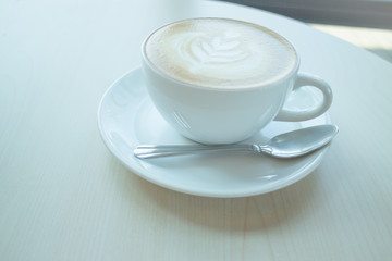 Hot cup of coffee latte