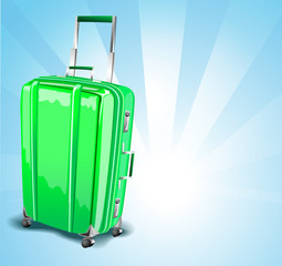 Green suitcase for travel on a blue background