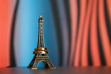 Eiffel tower souvenir with rings on it