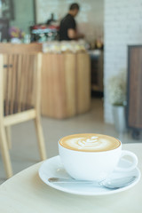 Hot cup of coffee latte