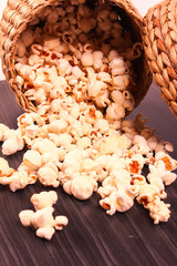 popcorn spread on wooden base